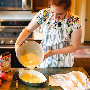 Preparing Peach Cobbler Dessert